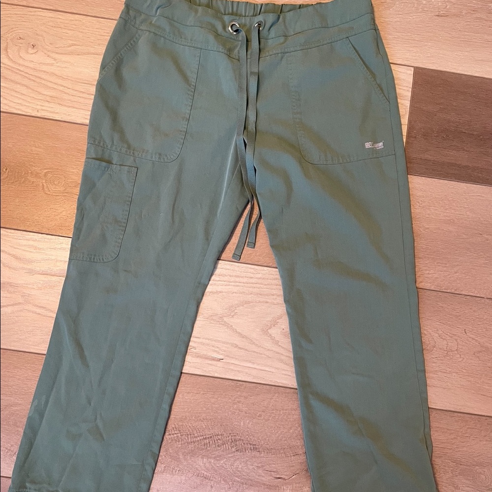 Greenish teal. Medium petite